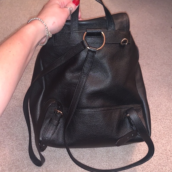Black coach backpack.